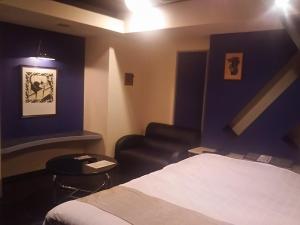 Postel nebo postele na pokoji v ubytování Hotel Sting