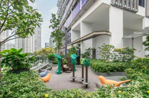 Сад в Ascott Orchard Singapore