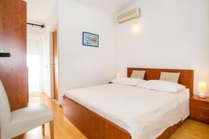 Apartments Zanic on The Beach客房内的一张或多张床位