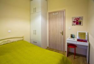 A bed or beds in a room at Oikia Preveza