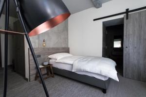 Letto o letti in una camera di Seven Boutique Hotel