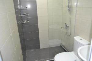 Koupelna v ubytování Apartment near the Beach Batumi-Gonio + 19 fotografií