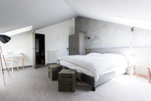 Letto o letti in una camera di Seven Boutique Hotel