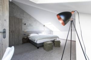 Letto o letti in una camera di Seven Boutique Hotel