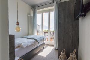 Letto o letti in una camera di Seven Boutique Hotel