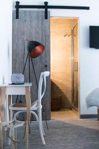 TV o dispositivi per l'intrattenimento presso Seven Boutique Hotel
