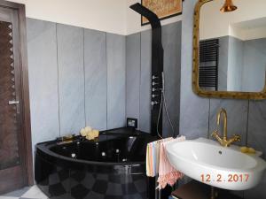 Koupelna v ubytování Casa Nori + 34 fotografií