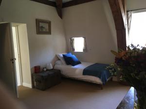 Postel nebo postele na pokoji v ubytování Maison d'Hôtes Chandon de Briailles