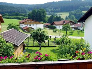 a view of a village with houses and flowers at Fischer Willi in Bad Koetzting