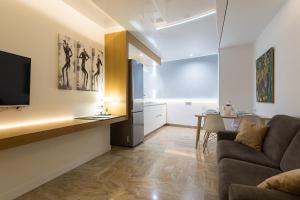 Posezení v ubytování Suites Garden Loft Andy Warhol