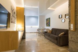 Posezení v ubytování Suites Garden Loft Andy Warhol