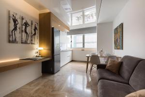 Posezení v ubytování Suites Garden Loft Andy Warhol