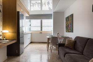Posezení v ubytování Suites Garden Loft Andy Warhol