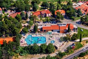 an aerial view of a resort with a swimming pool at Hotel Cliff Belvedere in Izola