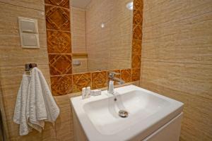 Kúpeľňa v ubytovaní Apartamenty Grodzka 8 + 33 fotografií