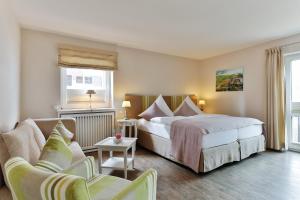 Postel nebo postele na pokoji v ubytování Hotel Uthland