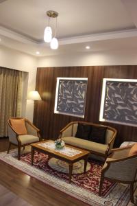 Posezení v ubytování Charoen Hotel