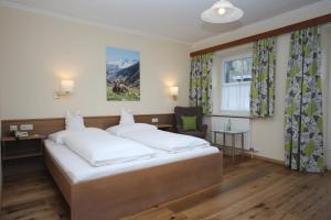 Cama o camas de una habitación en Hotel-Garni Schernthaner