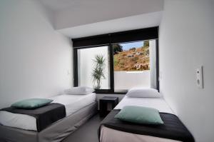 Katil atau katil-katil dalam bilik di Seametry Apartments