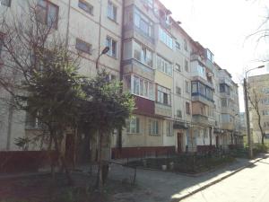 a large building on the side of a street at Daily apartment Sumy in Sumy