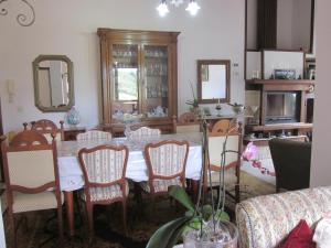 a dining room with a table and chairs at Bed&Breakfast Le Valli del Cerrano in Pineto
