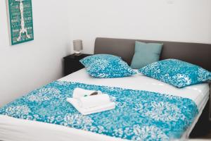 Postel nebo postele na pokoji v ubytování Apartments Stojanovic