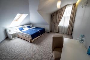 Posteľ alebo postele v izbe v ubytovaní Hotel Aleksandria