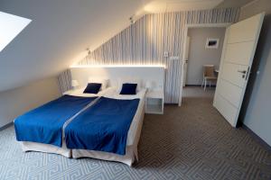 Posteľ alebo postele v izbe v ubytovaní Hotel Aleksandria