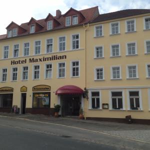 a large yellow building with a hotel maximilian at Hotel Maximilian in Zeitz