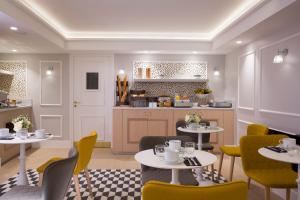 Ресторант или друго място за хранене в Hôtel Pastel Paris