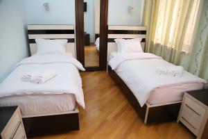 Voodi või voodid majutusasutuse Hotel For You toas