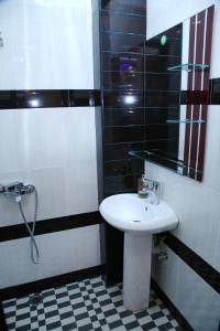 Vannituba majutusasutuses Hotel For You