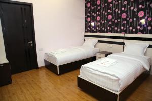 Voodi või voodid majutusasutuse Hotel For You toas