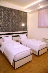 Voodi või voodid majutusasutuse Hotel For You toas