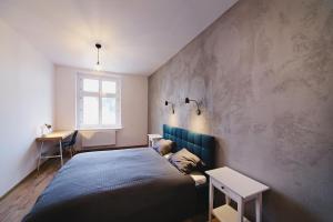 Кровать или кровати в номере Apartamenty River View od WroclawApartament-pl
