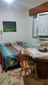 Viale Bari Apartmentにあるベッド