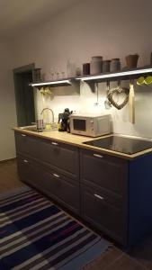 Kuchyňa alebo kuchynka v ubytovaní Zrínyi 11 Apartments