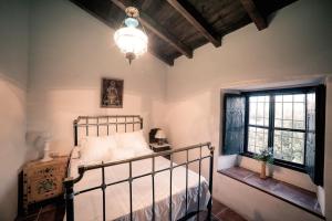 Кровать или кровати в номере Cortijo Montano