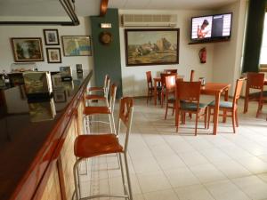 TV a/nebo společenská místnost v ubytování Hotel El Castell