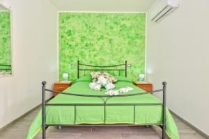 Postel nebo postele na pokoji v ubytování Casa vacanze Il Salice
