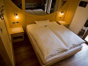 Postel nebo postele na pokoji v ubytování Hotel El Paster