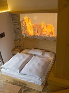 Postel nebo postele na pokoji v ubytování Hotel El Paster