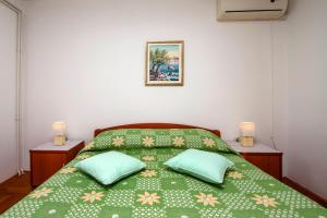 Postel nebo postele na pokoji v ubytování Rooms Stefania