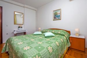 Postel nebo postele na pokoji v ubytování Rooms Stefania