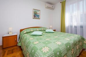 Postel nebo postele na pokoji v ubytování Rooms Stefania