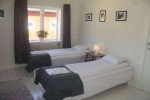 Säng eller sängar i ett rum på Alvaret Hotel & Hostel