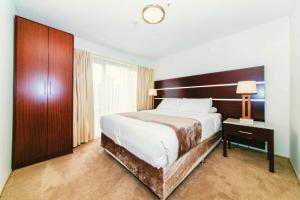 Ένα ή περισσότερα κρεβάτια σε δωμάτιο στο Airport Gateway Hotel