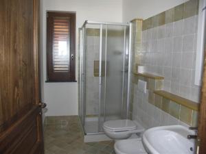 Ett badrum på Villa Hermes Case Vacanza