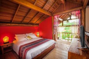 Giường trong phòng chung tại Smart Hotel Pousada Reserva Camburi +100 ảnh