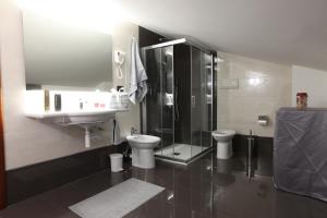 A bathroom at Amira Luxury Apartments Még 36 kép